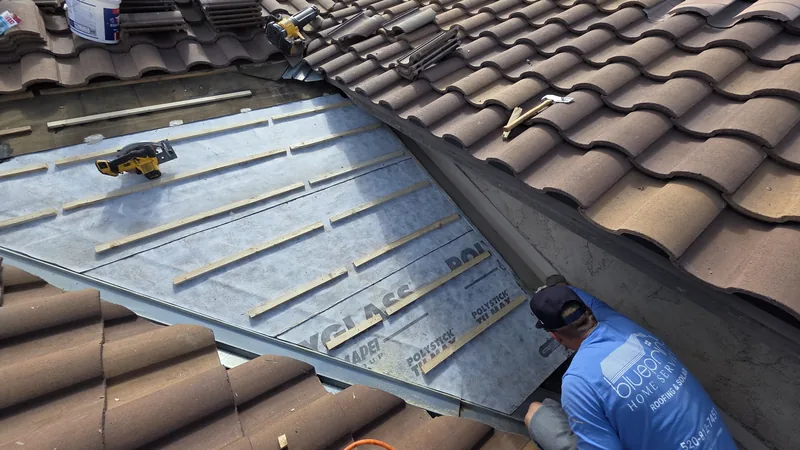 Blueprint Home Services crew repairing tile roof in Tucson, AZ