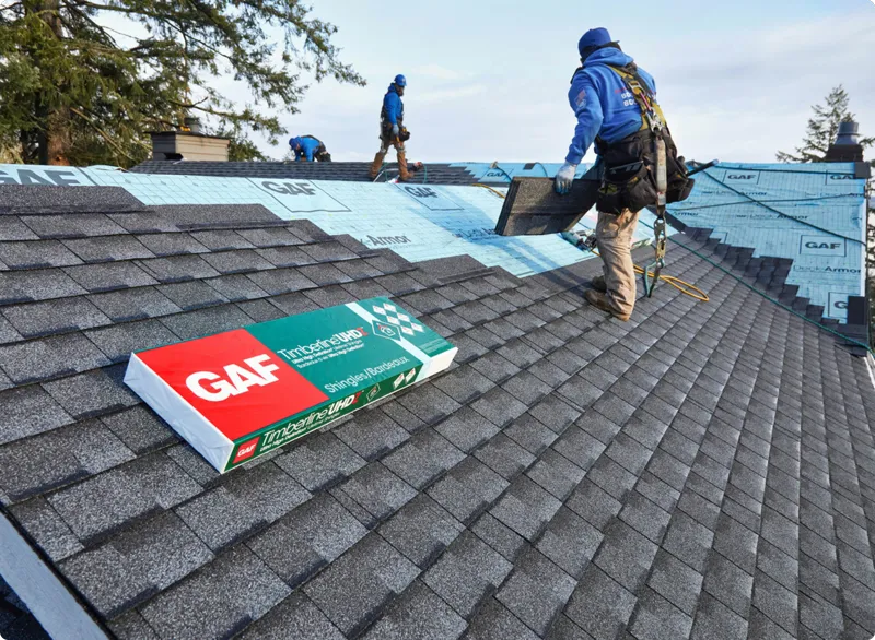 GAF Timberline shingle installation with branded packaging on a residential roof